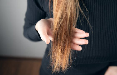 Close-up of brittle, breaking hair ends